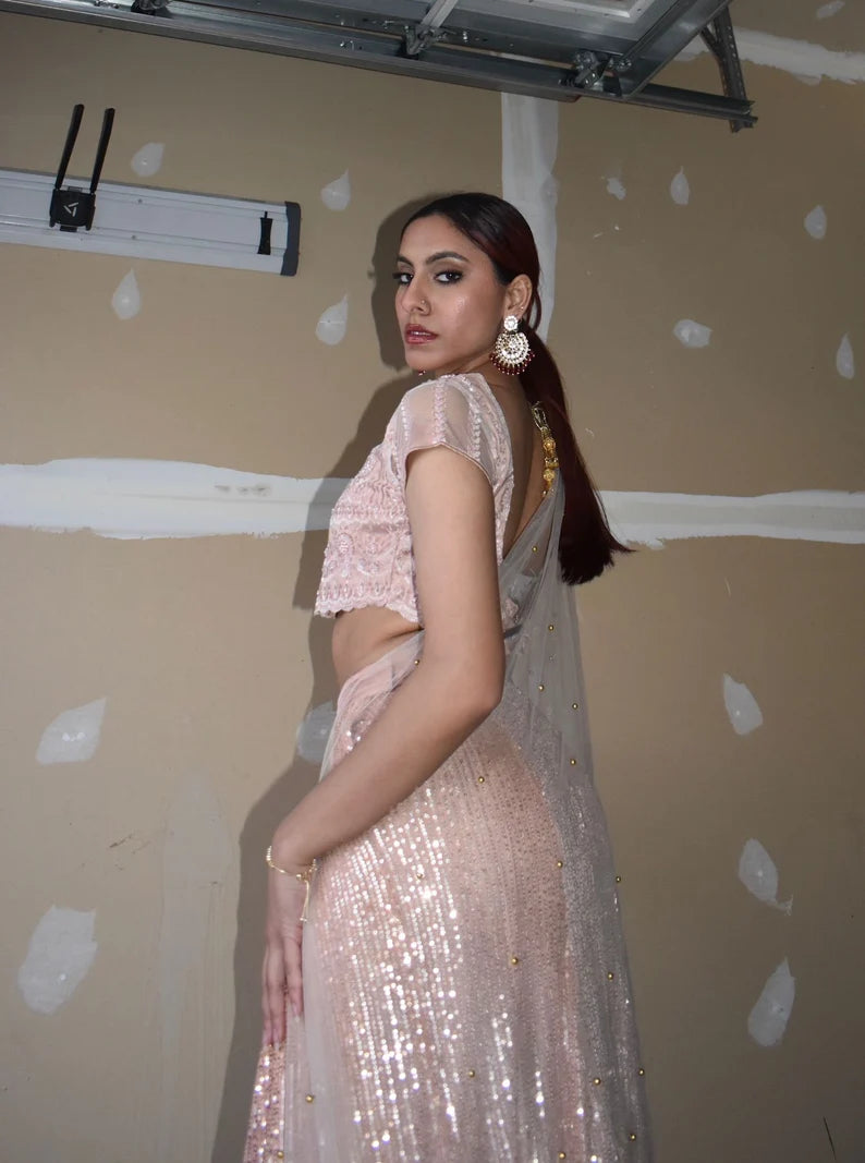 SANJANA DOUBLE LAYERED PEACH LEHNGA SET